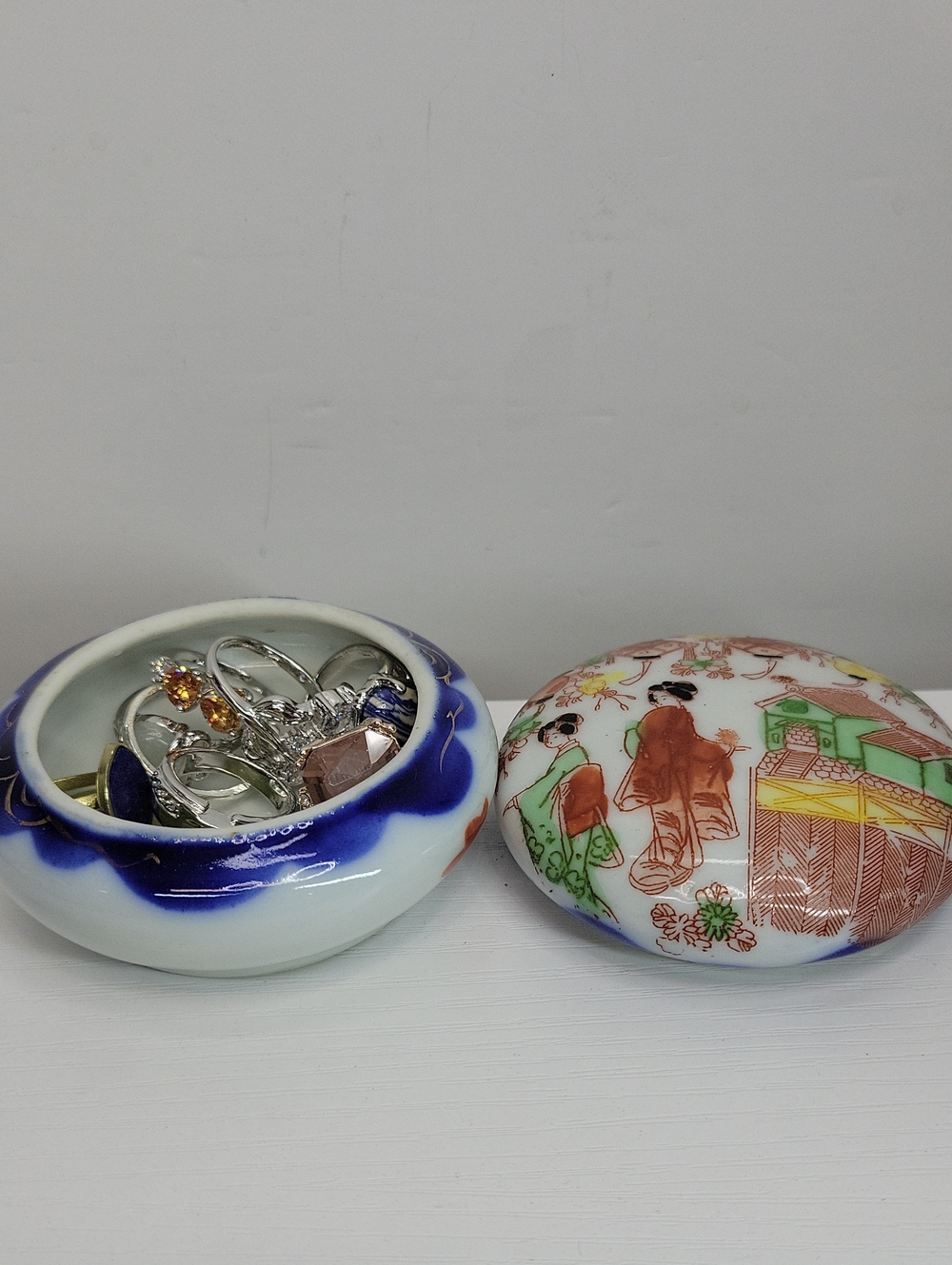 Decorative Porcelain Trinket Box with Asian Motif Filled With 6-7 rings